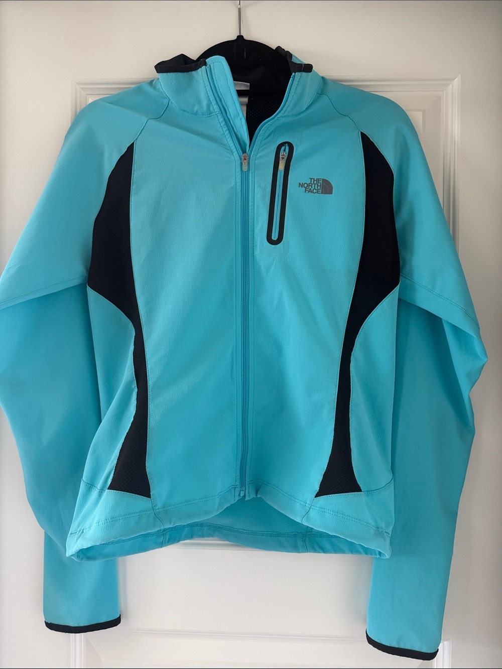 The North Face Turquoise Softshell Jacket with Black Accents